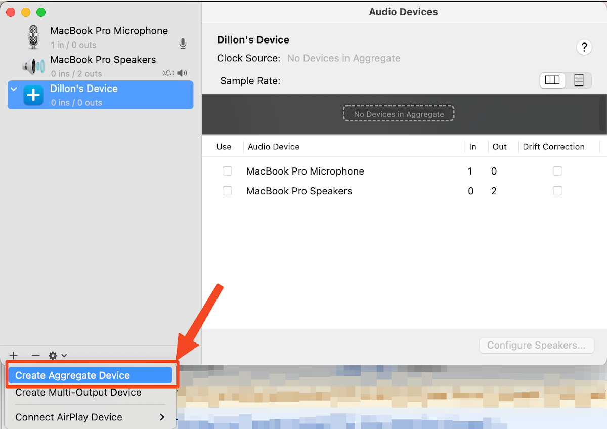 macOS 音频设备设置的截图。一个红色箭头指向左下角的 